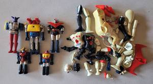 lot 228 image: MADE IN JAPAN VINTAGE 1970S DIE CAST TRANSFORMERSROBOTS TOYS PLUS MORE AS SHOWN. CHECK THESE OUT