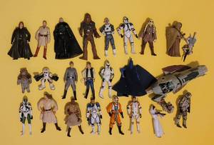 lot 265 image: LOT OF 24 COLLECTIBLE STAR WARS ACTION FIGURES RANGING IN SIZE FROM 3 - 4 EACH. (SOLD 24X THE MONEY)