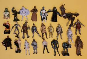 lot 275 image: LOT OF 24 COLLECTIBLE STAR WARS ACTION FIGURES RANGING IN SIZE FROM 3 - 4 EACH. (SOLD 24X THE MONEY)