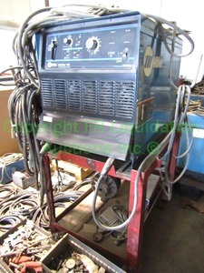 lot 1 image: Miller Gold Star 452 welder with accessories and cart