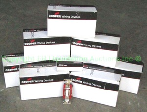 lot 60 image: Cooper arrow hart light switches, 8 boxes full