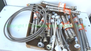 lot 35 image: Stainless steel braided water heater and plumbing hoses