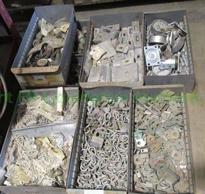 lot 197 image: Assorted industrial hardware including steel cart wheels
