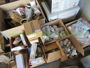 lot 245 image: Assorted plumbing parts and hardware, generous quantity