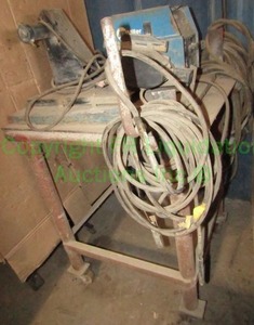 lot 287 image: Miller 24V constant speed wire feeder with cart