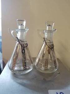 lot 25 image: Glass oil and vinegar bottles