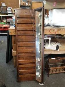 lot 79 image: Hanging lighted wine glass bar holder