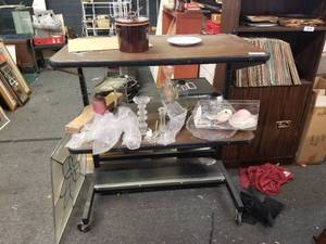 lot 70 image: Shelf unit on wheels with contents
