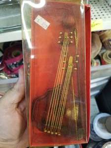 lot 109 image: Box of display stringed instruments