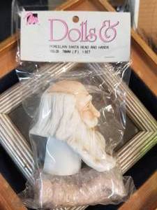 lot 110 image: Porcelain Santa head  and hands