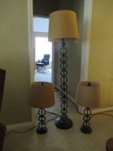 lot 24 image: IRON SCROLL METAL BASE 2 TABLE LAMPS AND FLOOR LAMP SET.  FLOOR 61 AND TABLE LAMPS 27 12