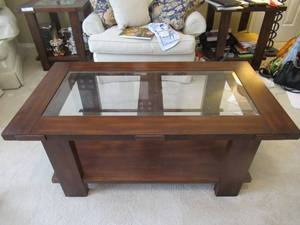 lot 34 image: ASHLEY FURNITURE COMPANY SOLID WOOD COFFEE TABLE WITH GLASS 48 X 26 X 20 MATCHES LOT 22 AND 23