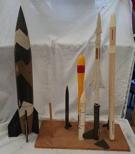 lot 160 image: Model rockets and display base