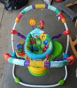 lot 153 image: Baby Einstein Bouncy Chair