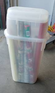 lot 182 image: Rubbermaid Gift Wrap Storage Container (includes contents)