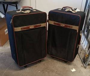 lot 236 image: 2 Rugged Traveler Upright Rolling Luggage Cases