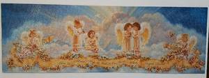 lot 289 image: Mounted Puzzle Depicting Little Angels on a Cloud