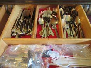 lot 35 image: WALLACE 188 STAINLESS LOTUS FLATWARE, TOWLE SILVERPLATE CAKEPIE SERVER, BOX OF CUBE SALT AND PEPPER SHAKERS, ASHLAND TEALIGHT CANDLES, 2 TURKEY SALT AND PEPPER SHAKERS AND DRAWER FULL OF SCOTCH TAPE
