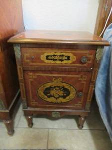 lot 111 image: 2 ANTIQUE CHERRY BEDSIDE TABLES 19 X 15 X 27. HAND CARVED INLAY WAS BOUGHT FROM CHRISTIES AUCTION HOUSE IN THE 90S. MATCHES LOTS 110, 112, 113  AND 114. 1 KNOB NEEDS FIXING