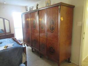 lot 113 image: ANTIQUE CHERRY ARMOIRE 103 X 24 X 74. HAND CARVED INLAY WAS BOUGHT FROM CHRISTIES AUCTION HOUSE IN THE 90S. MATCHES LOTS 110, 111, 112  AND 114. CONTENTS NOT INCLUDED