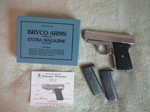 lot 141 image: JENNINGS .380 PISTOL MFG BY BRYCO ARMS WITH FULLY LOADED EXTRA MAGAZINE IN ORIGINAL BOX