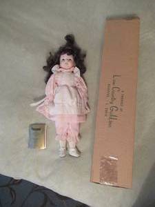 lot 164 image: SEYMOUR MANN COLLECTIBLE DOLL IN ORIGINAL BOX