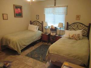 lot 165 image: WROUGHT IROM AND WOOD TWIN BEDS