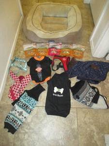 lot 173 image: BEAUTYREST DOG BED, NUTRI SOURCE DOG TREATS 4 LAMB AND 1 SALMON, SEVERAL WINTER TIME DOG SWEATERS AND A COUPLE HARNESSES