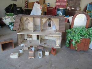 lot 222 image: DOLL HOUSE HANDMADE WITH MINI PORCLEIN BATHTUB, SINK, TOILET AND MINI FURNITURE. FAUX FLOWERS AND MIRROR