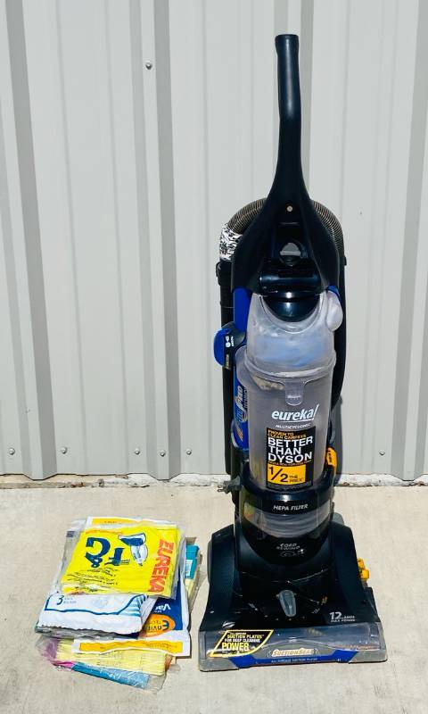 lot 13 image: Eureka Vacuum Cleaner Model AS1101 and various Vacuum bags