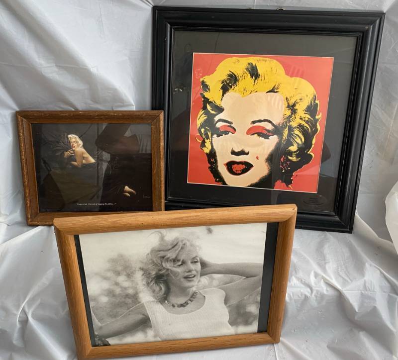 lot 203 image: 3 Framed Pictures of Marilyn Monroe The On Redground 1 in a series of 2