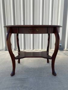 lot 152 image: Wooden Oval Occasional Table with Center Drawer