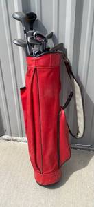 lot 25 image: Various Right Handed Golf Clubs in Bag and Left Handed Putter