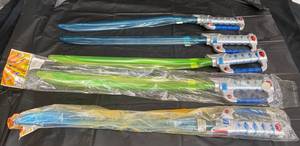 lot 33 image: Kids Light up Swords by Q.D. Toys
