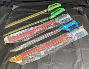 lot 35 image: Kids Light up Swords by Q.D. Toys
