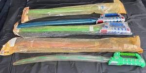 lot 37 image: Kids Light up Swords by Q.D. Toys