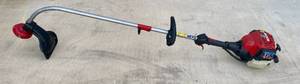 lot 22 image: Troybilt 4 Cycle Gas Powered Weedeater No. TB635EC