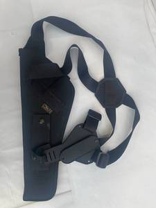 lot 48 image: Sidekick Vertical Shoulder Holster by Uncle Mikes