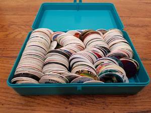 lot 55 image: Pogs in case