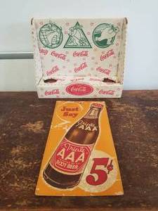 lot 80 image: Coke and Triple AAA Root beer advertisment pieces