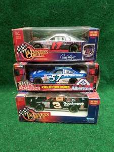 lot 214 image: Nascar 124 diecast car collectibles