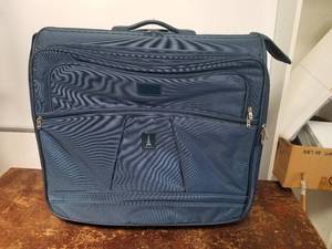 lot 212 image: Luggage with tag
