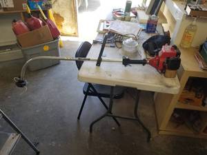 lot 313 image: Homelite gas weed eater