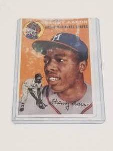 lot 83 image: Hank Aaron Topps baseball card #128 - Authenticity unknown
