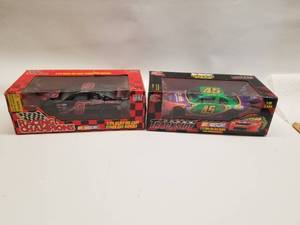lot 40 image: Adam Petty #45 and Lake Speed #9 Racing Champion diecast race cars 124