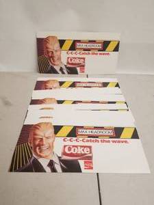 lot 157 image: Coke Coca Coe Max headroom advertising store shelf pieces - lot of 10
