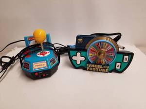 lot 255 image: Mrs. Pacman and Wheel of Fortune games