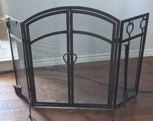 lot 13 image: Black 3 Panel Arched Fireplace with 3 accessories.