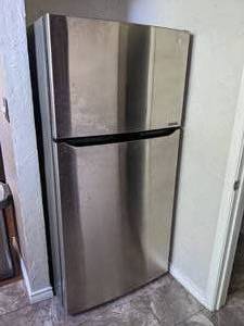 lot 14 image: LG Smart Inverter refrigerator with ice maker on top. Contents not included.