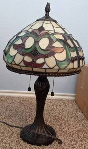 lot 23 image: Tiffany Style Table Lamp. Estimated 23 inches tall and diameter about 13 inches.
